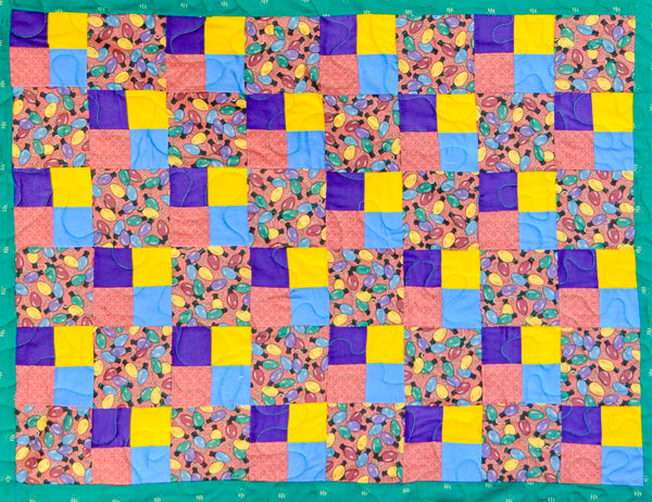 Photo of Purple Lady Longarm Quilting